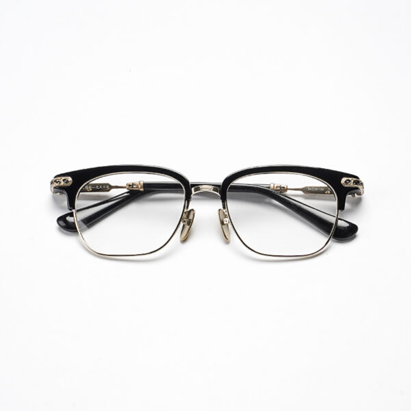 A strong browline and semi-rimless titanium construction give